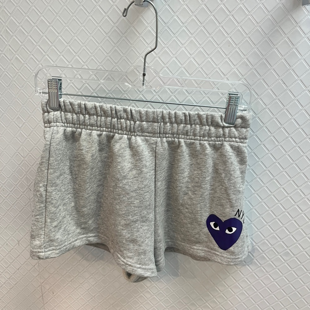 Gray Shorts with Purple Comme des Garçons PLAY design and ‘NYU’ writing